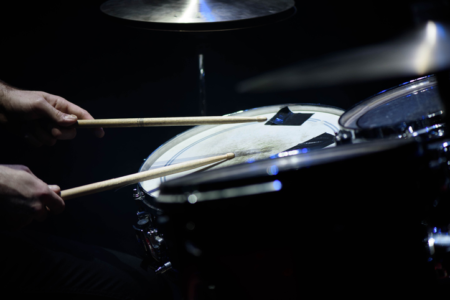 Drummer playing drumset