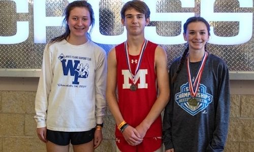 Two-time state champion Maddyn Conn of White Plains (R) displays her medals with fellow medalists Anna Strickland (L) and Munford’s Dakota Frank after Saturday’s State Indoor Track Meet. (Photo by Stephan Frank)