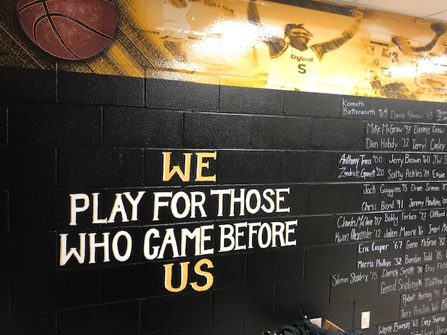 Here is a section of the wall in the Oxford basketball film room that recognizes all the former players in the program dating back to the 1940s.