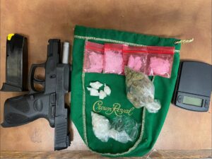 Evidence photo of gun and drugs seizure