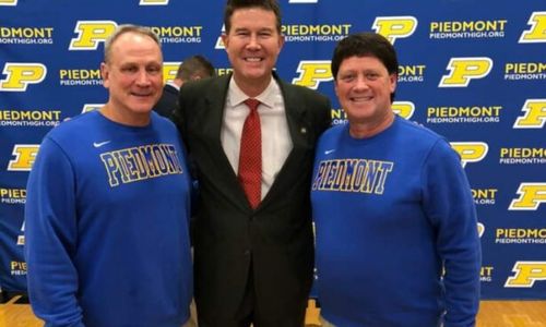 Long-time Piedmont defensive coordinator James Blanchard, former Alabama secretary of state John Merrill and former Piedmont head football coach Steve Smith pose for a picture during one of the school’s five state-championship celebrations. (Submitted photo)