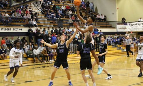 Jacksonville’s John Broom goes up for two against White Plains in Saturday’s Class 4A, Area 10 final at Jacksonville. (Photo by Greg Warren)