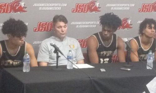 On the cover, the Yellow Jackets take questions after the 57-50 loss.