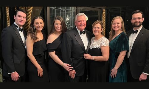 Dr. Bill Meehan, center, is joined by his family at the University of Alabama’s Education Hall of Fame induction ceremony on Feb. 11. Pictured, from left, are Dr. Drew Meehan, Dr. Allison Meehan, Carol Grace Meehan, Dr. Bill Meehan, Beth Meehan, Caroline Meehan and Will Meehan.