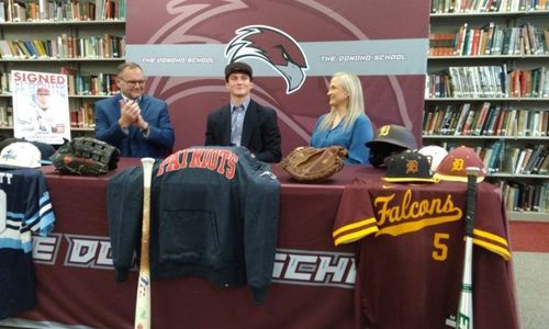 Family applauds Donoho’s Lucas Elliott on Tuesday after he signed to play college baseball for Wallace State-Selma. (Submitted photo)