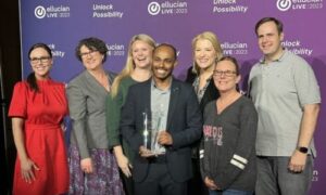 University staffers Sabin Banjara (center), Jessica Wiggins (far left), Charlotte Cole (third from left), Candice Truitt (second from right) and Shaun Stancil (far right) accepted the award at the Ellucian Live conference in New Orleans.