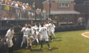 Oxford players celebrate with fans at Bud McCarty Field after sweeping their Class 6A semifinal series with Cullman on Thursday. (Photo by Joe Medley)