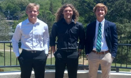 The Calhoun County Quarterback Club awarded $5,000 scholarships to (from left) Ohatchee’s Chris Ferguson, Wellborn’s Grayson Johnson and Jacksonville’s Drew Pridgen. A fourth recipient, Saks’ Owen Petty, is not pictured. (Photo by Joe Medley)