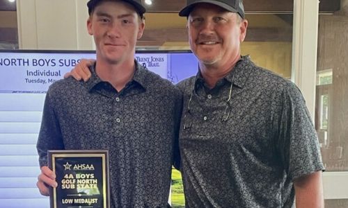 White Plains’ Sawyer Edwards (left) poses with Wildcats coach Chris Randall after finishing as low medalist at Tuesday’s Class 4A, North 3 Sub-State at Silver Lakes. (Submitted photo)