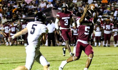 Anniston’s Jayden Lewis makes an interception that he returned 95 yards to help Anniston even up with Wellborn at halftime Friday at Anniston. The Bulldogs went on to win 38-22. (Photo by Greg Warren/For East Alabama Sports Today)