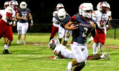 Ohatchee’s Nate Jones breaks one of his two long touchdown runs en route to a 155-yard night against Saks. (Photo by Greg Warren)