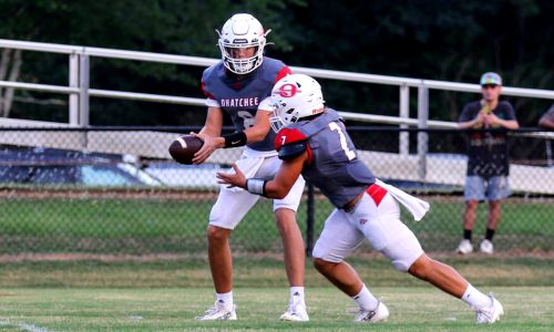 Ohatchee quarterback Jake Roberson hands off to Nate Jones during the Indians’ game against Saks on Aug. 24. Ohatchee hopes to improve to 4-0 in a key Class 3A, Region 6 home game against Sylvania on Friday. (Photo by Greg Warren/For East Alabama Sports Today)