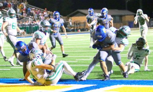 Piedmont’s Luke Rhinehart fights to get over the goal line for the game-winning two-point conversion as the Bulldogs beat Hokes Bluff on Friday at Piedmont. (Photo by Jean Blackstone/For East Alabama Sports Today)