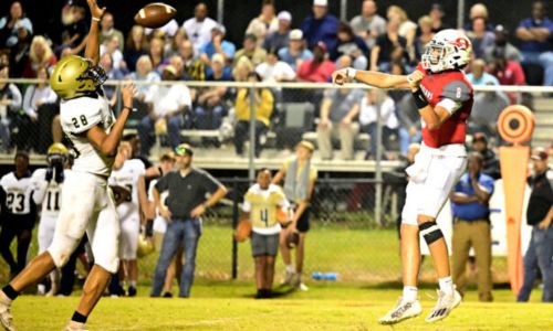 Jacksonville’s Darel Atkinson, Jr., defends as Ohatchee’s Jake Roberson passed during their game on the Creekbank on Friday. (Photo by B.J. Franklin/Gunghophotos.com)