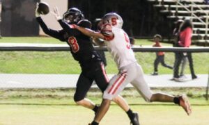 Weaver’s Harper Williams catches a touchdown pass in the second quarter against Saks on Friday at Weaver. (Photo by Greg Warren/For East Alabama Sports Today)