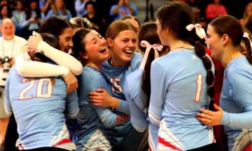 Pleasant Valley players celebrate their Class 2A state volleyball title Wednesday in Birmingham’s Bill Harris Arena. (Photo by Krista Larkin/For East Alabama Sports Today)