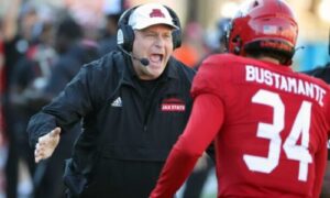 Jax State coach Rich Rodriguez congratulates defensive back Jalen Bustamante during the Gamecocks’ victory over Louisiana Tech on Saturday. (Submitted photo)