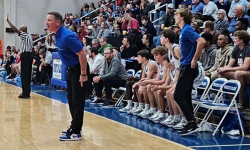 White Plains coach Chris Randall gives instruction during the Wildcats’ game against Alexandria. They are No. 3 in Class 4A in the season’s first ASWA poll. (Photo by Joe Medley)