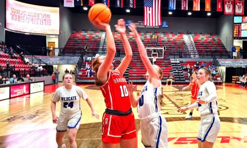 Ohatchee’s Emily Riddle shoots against White Plains during Monday’s action in the Calhoun County tournament. (Photo by Joe Medley)