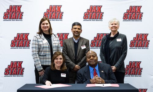 University and CDP officials signed an agreement on Jan. 19 to continue partnering through 2032. Pictured, from left: Leigha Cauthen, JSU Chief External Affairs Officer; Dr. Christie Shelton, JSU Provost and Senior Vice President for Academic Affairs; Dr. Tanveer Islam, head of the JSU Department of Emergency Management and Public Administration; Tony Russell, Superintendent of the Center for Domestic Preparedness; and Dr. Maureen Newton, Dean of the JSU College of Social and Behavioral Sciences. Photo by Alyssa Cash.
