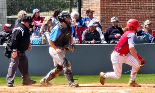 Ohatchee’s Jesse Baswell follows through on his game-tying double in the bottom of the seventh inning against Pleasant Valley on Saturday. (Photo by Joe Medley)