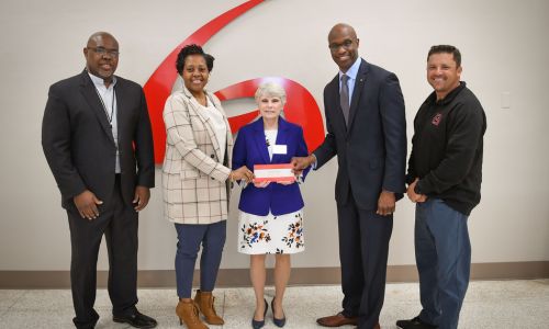 A check for $50,000 was presented to Dr. Kathy Murphy, middle, president of Gadsden State, and to Blake Lewis, far right, athletic director. Pictured are, from left, Spencer Williams, community relations manager in Etowah County; Dana McFarland, community relations manager in Calhoun County; and Terry Smiley, vice president of Alabama Power’s Eastern Division.