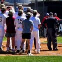 Marcus Lawler meets Donoho teammates at home plate after hitting a three-run home run in the first inning against Pleasant Valley on Saturday. The Falcons won 17-0 to clinch a playoff berth. (Photo by Joe Medley)