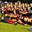 Donoho’s girls celebrate after winning their seventh consecutive Calhoun County soccer title Thursday, outlasting Jacksonville 2-1 after a penalty-kick shootout at Choccolocco Park. (Photo by Joe Medley)