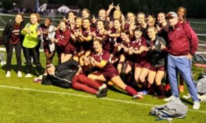 Donoho’s girls celebrate after winning their seventh consecutive Calhoun County soccer title Thursday, outlasting Jacksonville 2-1 after a penalty-kick shootout at Choccolocco Park. (Photo by Joe Medley)