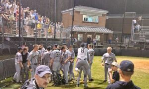 Oxford players celebrate with home fans’ after beating Mountain Brook 5-4 in 12 innings in Friday’s Game 3 of their Class 6A quarterfinal series at Bud McCarty Field. (Photo by Joe Medley)