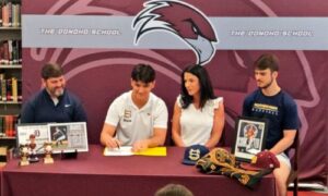 Donoho’s Blake Sewell, flanked by family, signs Monday to play baseball for Southern Union Community College.