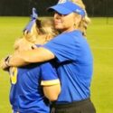 Rachel Smith and daughter Savannah Smith embrace at Choccolocco Park after the final game of Piedmont’s most recent state-tournament run. (Photo by Joe Medley)