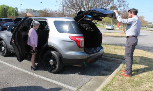 New Police Vehicle: Gadsden State Chief of Police Jay Freeman and President Kathy Murphy check out a police cruiser donated to the college by the City of Hokes Bluff.