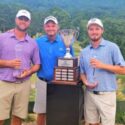 The winning team of Tanner Wells (left) and Jacob LeCroy (right) accept their trophy from Ted’s Charity Invitational tournament director Ted Gregerson after Sunday’s final round at Anniston Country Club. (Photo by Joe Medley)