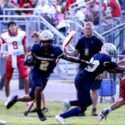 Jacksonville’s Zae English follows a block against Ohatchee during Friday’s jamboree at White Plains. (Photo by Greg Warren)