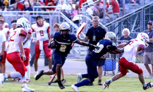 Jacksonville’s Zae English follows a block against Ohatchee during Friday’s jamboree at White Plains. (Photo by Greg Warren)