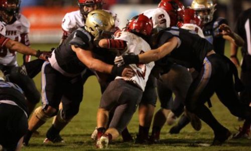 Coosa Christian defenders close in on Fyffe’s Brycen Green during their game Friday at Coosa Christain. (Submitted photo)