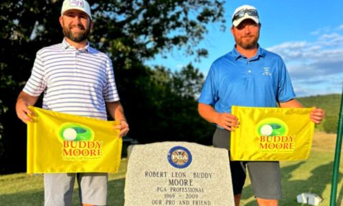 Brennan Clay (left) and Andrew Brooks teamed to win the 18th Buddy Moore Charity Golf Tournament, shooting 12 under par in Sunday’s final round and 28 under par over two days at Anniston Municipal Golf Course. (Submitted photo)