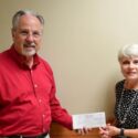 Rep. Mark Gidley presents donation check to President Kathy Murphy for Gadsden State scholarships.