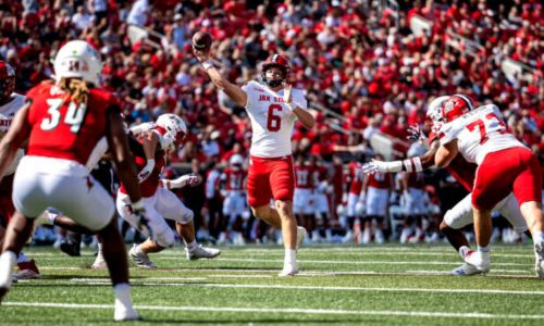 Jacksonville State quarterback Tyler Huff launches a touchdown pass to tight end Sean Brown at Louisville on Saturday. (Photo by Brandon Roberts/Jax State)