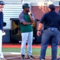 Choccolocco Monsters coach Ricky Ray Clayton points during a pregame meeting with umpires in June at Choccolocco Park. He is the Sunbelt League’s coach of the year, the league announced Friday. (Photo by Joe Medley)