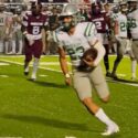 Hokes Bluff’s Brenton Hale runs for the first of his three touchdowns at Anniston on Friday. The Eagles won, 37-18. (Photo by Joe Medley)