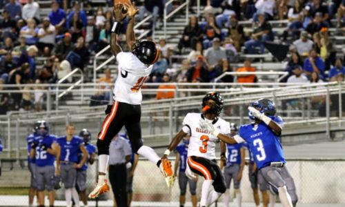 Alexandria’s Quendavion McDowell makes one of his two interceptons at White Plains on Friday. (Photo by Greg Warren/For East Alabama Sports Today)