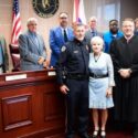 Sgt. David Bankson, Gadsden State President Dr. Kathy Murphy, Probate Judge Scott Hassell and GSCC Chief of Police Jay Freeman with the Etowah County Commission after Bankson’s swearing-in.