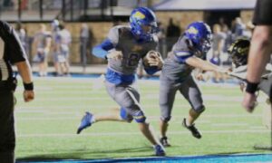 Piedmont quarterback Cole Wilson rushes for a touchdown against B.B. Comer on Friday. (Photo by Jean Blackstone/For East Alabama Sports Today)