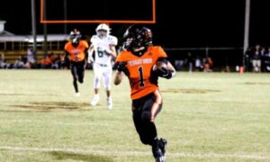 J.J. Beason breaks a long run against Ashville on Friday at Alexandria. (Photo by Greg Warren/For East Alabama Sports Today)