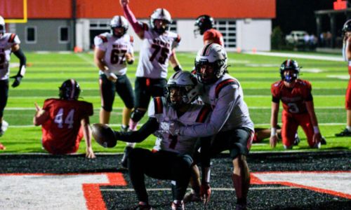 Weaver teammates celebrate after Kaden Gooden scores on the final play, and the Bearcats beat Westbrook Christian 37-24 on Friday at Rainbow City. (Photo by Brad Campbell/For East Alabama Sports Today)