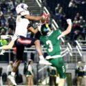 Weaver’s KeShawn Allen goes up for a catch between two Sylvania defenders during their first-round playoff game at Sylvania on Friday. (Photo by Greg Warren/For East Alabama Sports Today)