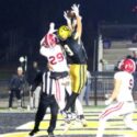 Oxford’s Nick Richardson goes up between defenders to pull down a touchdown reception just before halftime of the Yellow Jackets’ 34-14 victory over Hartselle in Friday’s second-round playoff game at Oxford. (Photo by Greg Warren/For East Alabama Sports Today)