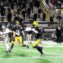 Oxford’s Jaylin Taylor heads to the end zone with one of his four touchdown catches Friday, and the Yellow Jackets beat Fort Payne 28-26 to reach the Class 6A semifinals. (Photo by Greg Warren/For East Alabama Sports Today)